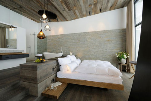 Rustieke slaapkamer van het Wiesergut hotel Rustieke slaapkamer van het Wiesergut hotel