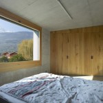 Beton en hout combinatie in slaapkamer ontwerp