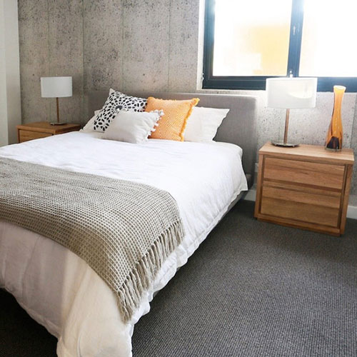 Betonnen muur in slaapkamer Betonnen muur in slaapkamer