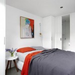 Betonnen vloer in moderne slaapkamer