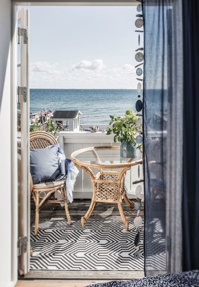 De mooie slaapkamer van een Deens visssershuisje De mooie slaapkamer van een Deens visssershuisje