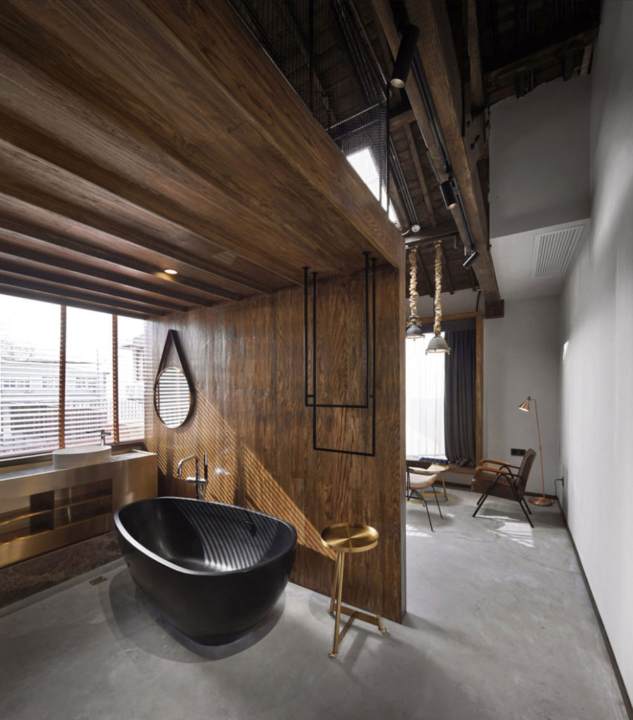 De rustiek stoere slaapkamers van het YU hotel in Shanghai De rustiek stoere slaapkamers van het YU hotel in Shanghai