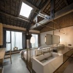 De rustiek stoere slaapkamers van het YU hotel in Shanghai