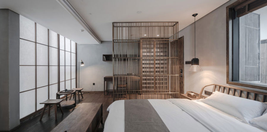 De rustiek stoere slaapkamers van het YU hotel in Shanghai De rustiek stoere slaapkamers van het YU hotel in Shanghai