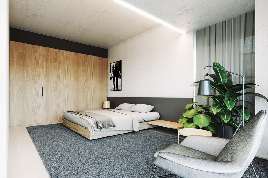 Deze strakke moderne slaapkamer met betonnen muren en plafond