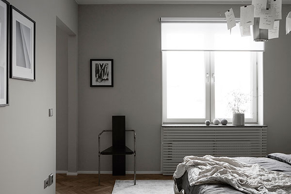 Exclusieve slaapkamer met verschillende tinten grijs