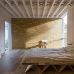 Gebruik van hout in stoere slaapkamer