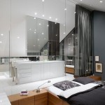 Glazen wand tussen slaapkamer en badkamer