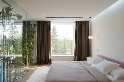Groen in een transparante slaapkamer Groen in een transparante slaapkamer