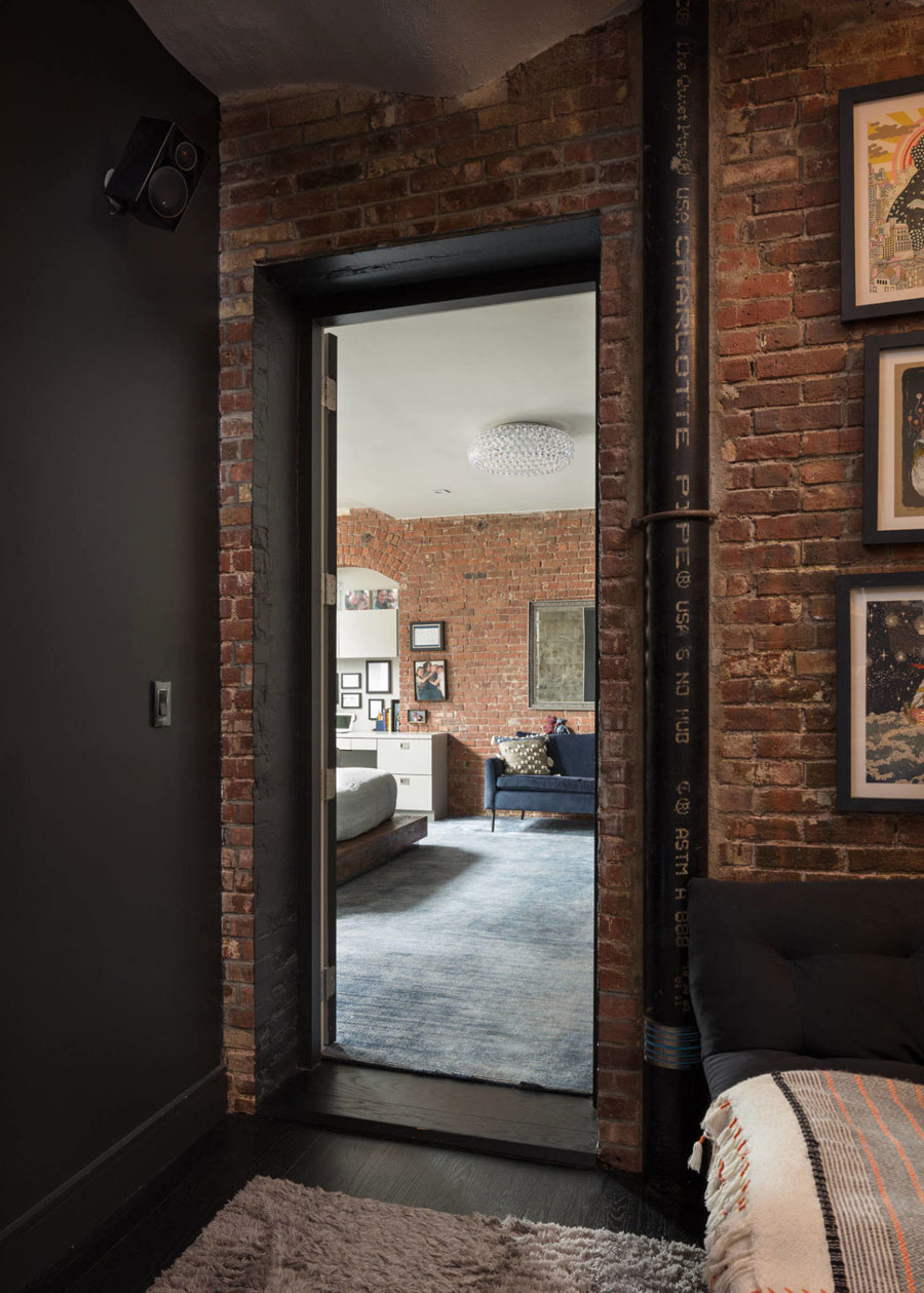 Industrieel chique slaapkamer in loft appartement in Tribeca New York