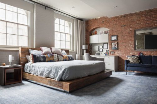 Industrieel chique slaapkamer in loft appartement in Tribeca New York