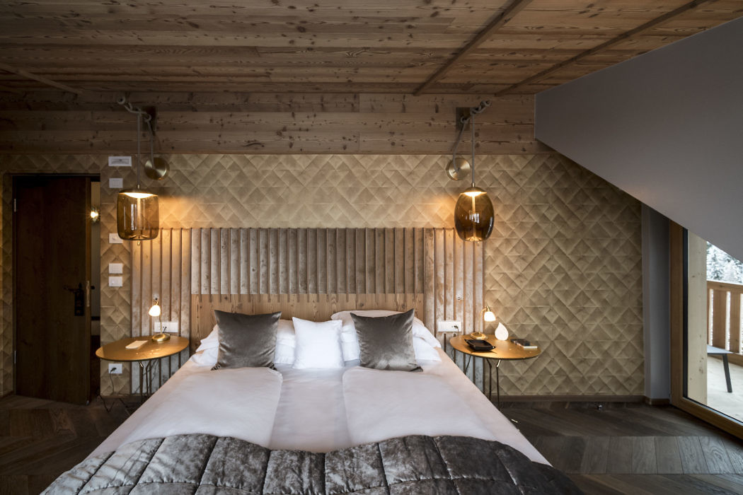 Luxe slaapkamer van een rustiek appartement in de Alpen Luxe slaapkamer van een rustiek appartement in de Alpen