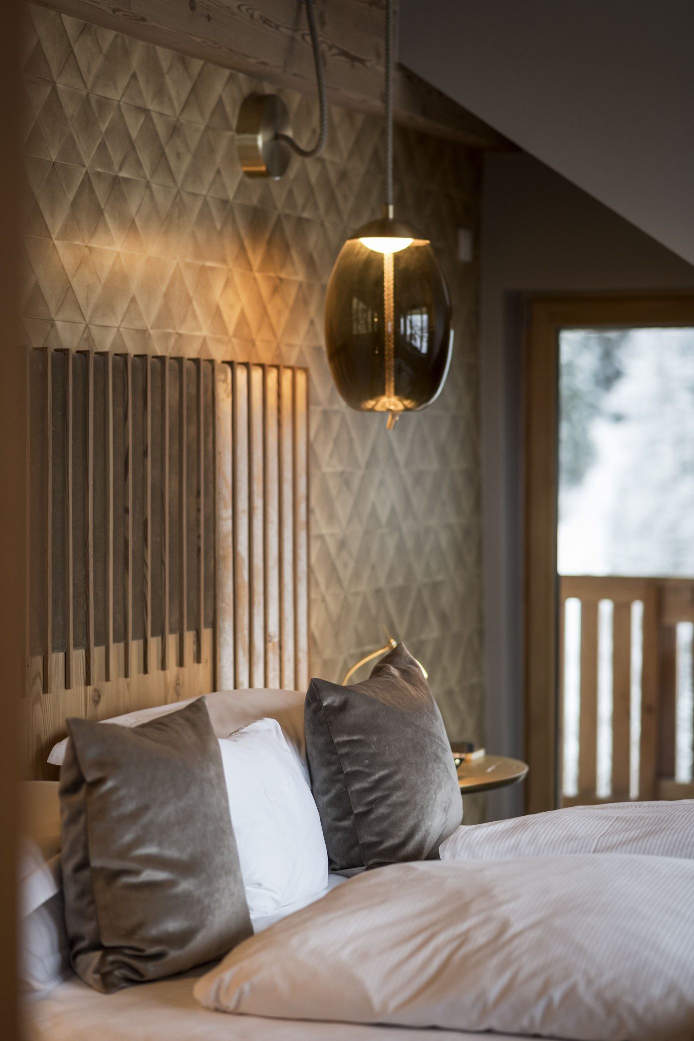 Luxe slaapkamer van een rustiek appartement in de Alpen Luxe slaapkamer van een rustiek appartement in de Alpen