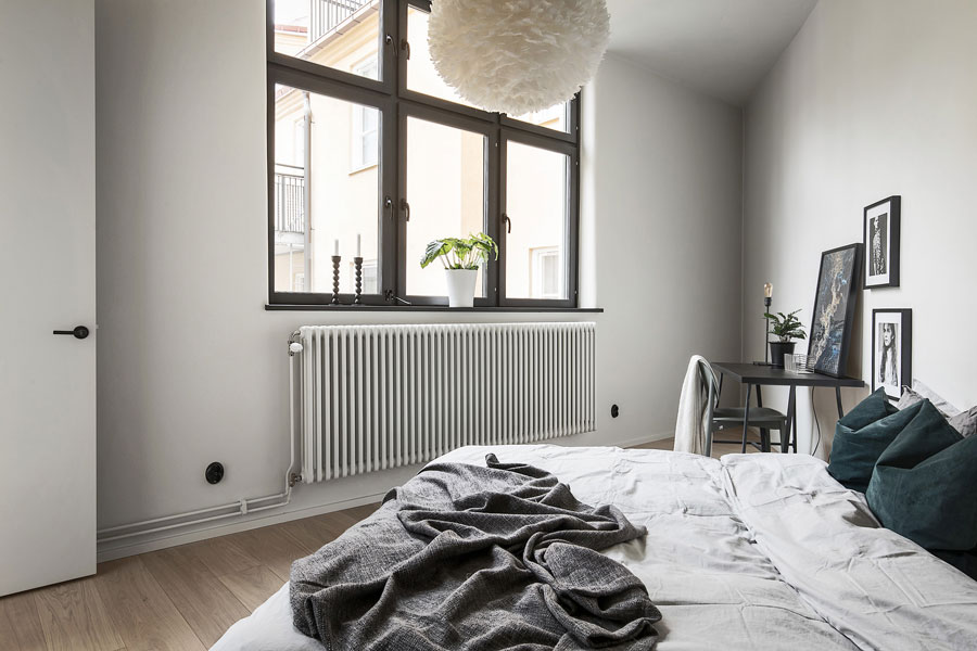 Minimalistische driehoekige slaapkamer Minimalistische driehoekige slaapkamer