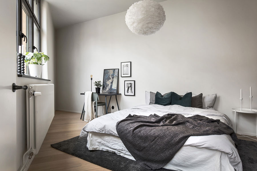 Minimalistische driehoekige slaapkamer Minimalistische driehoekige slaapkamer