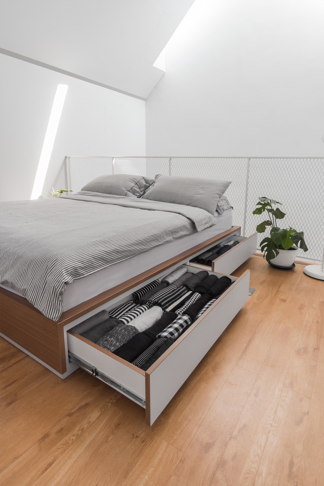 Minimalistische open slaapkamer op vide
