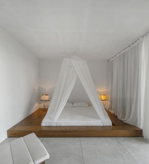 Minimalistische slaapkamer met Japans bed Minimalistische slaapkamer met Japans bed