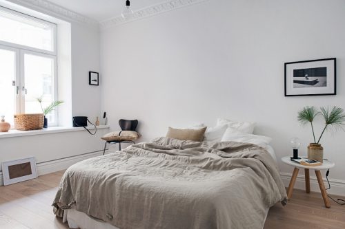 Minimalistische slaapkamer met warme tinten Minimalistische slaapkamer met warme tinten