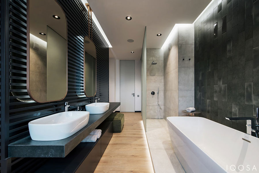Modern slaapkamer ontwerp met half open badkamer door IQOSA