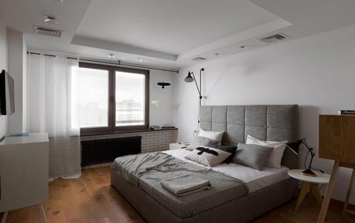 Moderne slaapkamer met hout en zwart staal Moderne slaapkamer met hout en zwart staal
