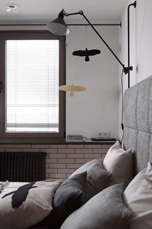 Moderne slaapkamer met hout en zwart staal Moderne slaapkamer met hout en zwart staal