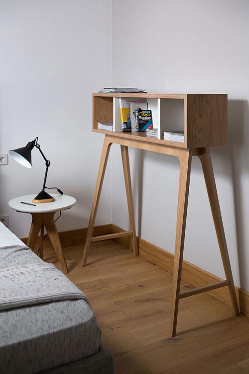 Moderne slaapkamer met hout en zwart staal Moderne slaapkamer met hout en zwart staal