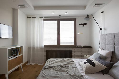 Moderne slaapkamer met hout en zwart staal Moderne slaapkamer met hout en zwart staal