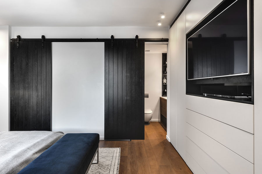 Moderne slaapkamer met een chique afwerking Moderne slaapkamer met een chique afwerking