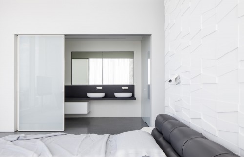 Moderne slaapkamer met structuur muur