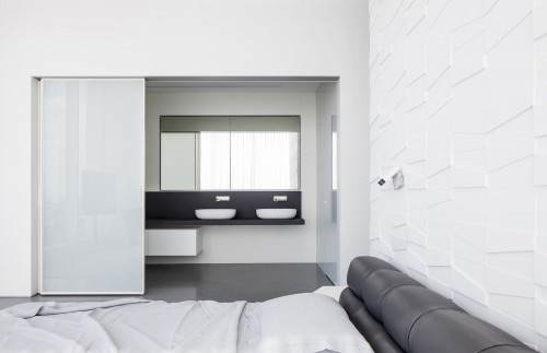 Moderne slaapkamer met structuur muur Moderne slaapkamer met structuur muur