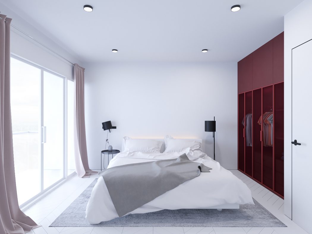 Moderne witte slaapkamer met roodtinten