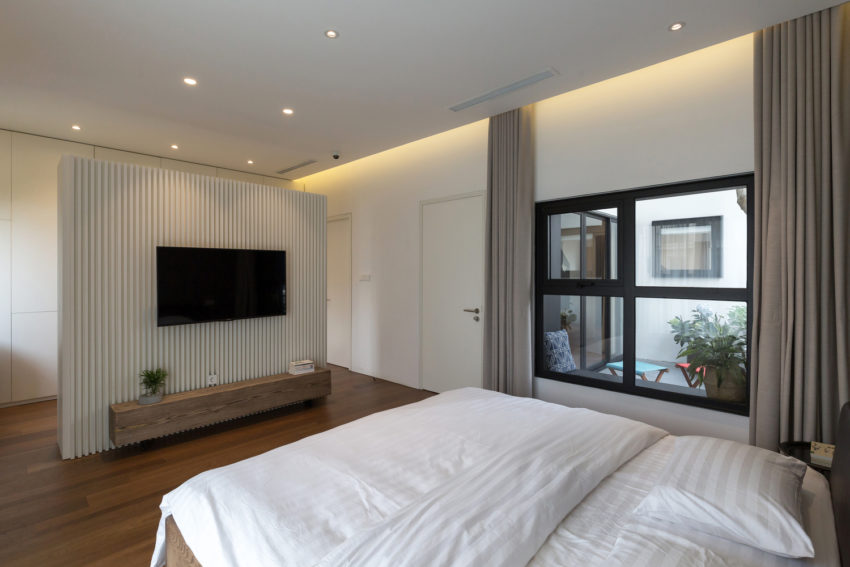 Mooi slaapkamer ontwerp met inloopkast en badkamer en suite