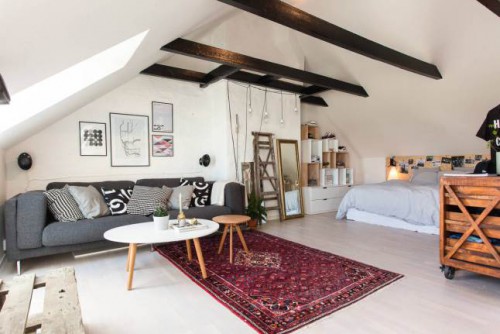 Open slaapkamer in een hip eenkamerappartement Open slaapkamer in een hip eenkamerappartement