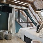 Rustieke chalet slaapkamer door Dröm Living