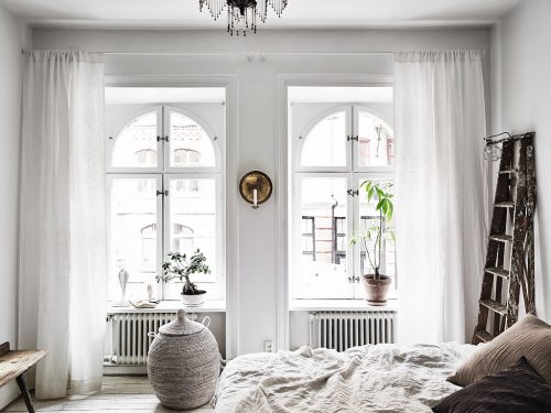 Scandinavische slaapkamer in bohemian vintage stijl