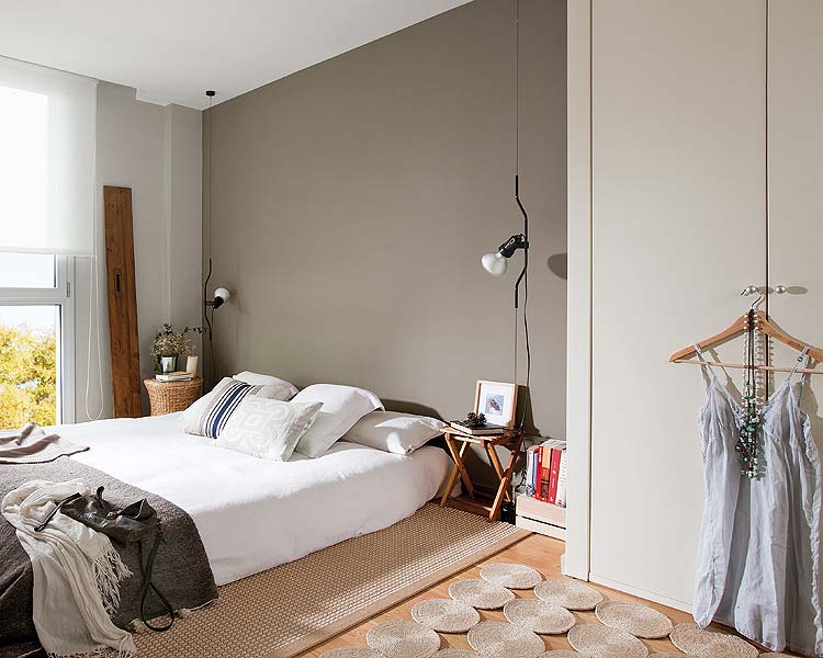 Sfeervolle slaapkamer in een penthouse appartement in Barcelona Sfeervolle slaapkamer in een penthouse appartement in Barcelona