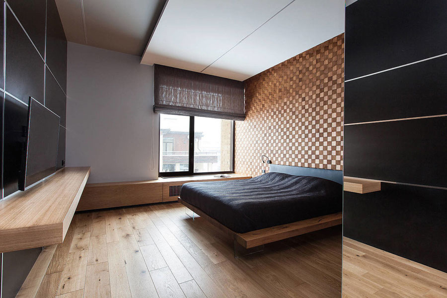 Sfeervolle slaapkamer met veel gebruik van hout
