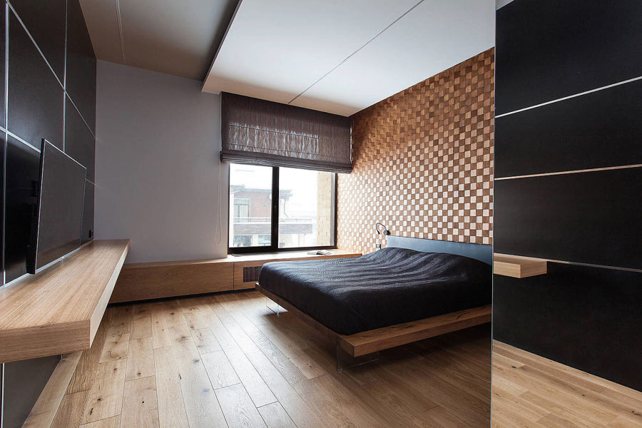 Sfeervolle slaapkamer met veel gebruik van hout Sfeervolle slaapkamer met veel gebruik van hout