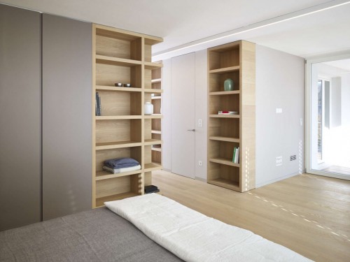 Slaapkamer met hout en glas