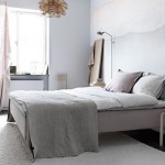 Slaapkamer met lichte zachte kleuren en mooi design