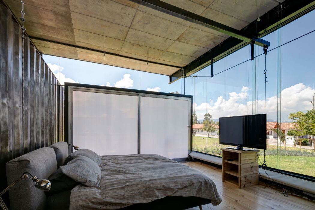 Slaapkamer van een industriële containerwoning Slaapkamer van een industriële containerwoning