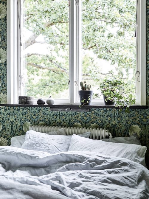 Slaapkamer vol met bloemetjes behang Slaapkamer vol met bloemetjes behang