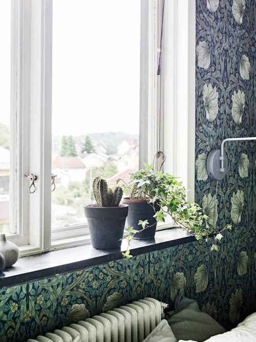 Slaapkamer vol met bloemetjes behang Slaapkamer vol met bloemetjes behang