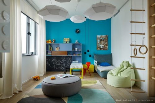 Speelse kinderkamer met een grote speelhoek Speelse kinderkamer met een grote speelhoek