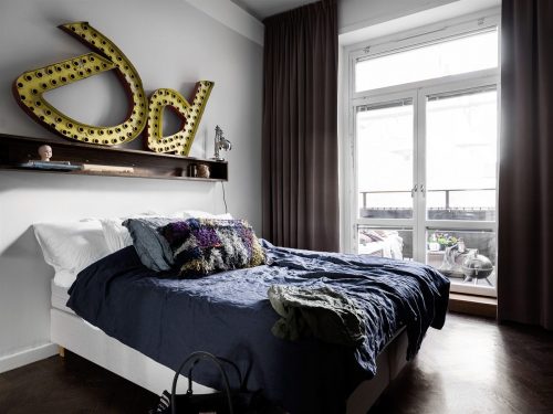 Stoere Scandinavische slaapkamer met grijze muren