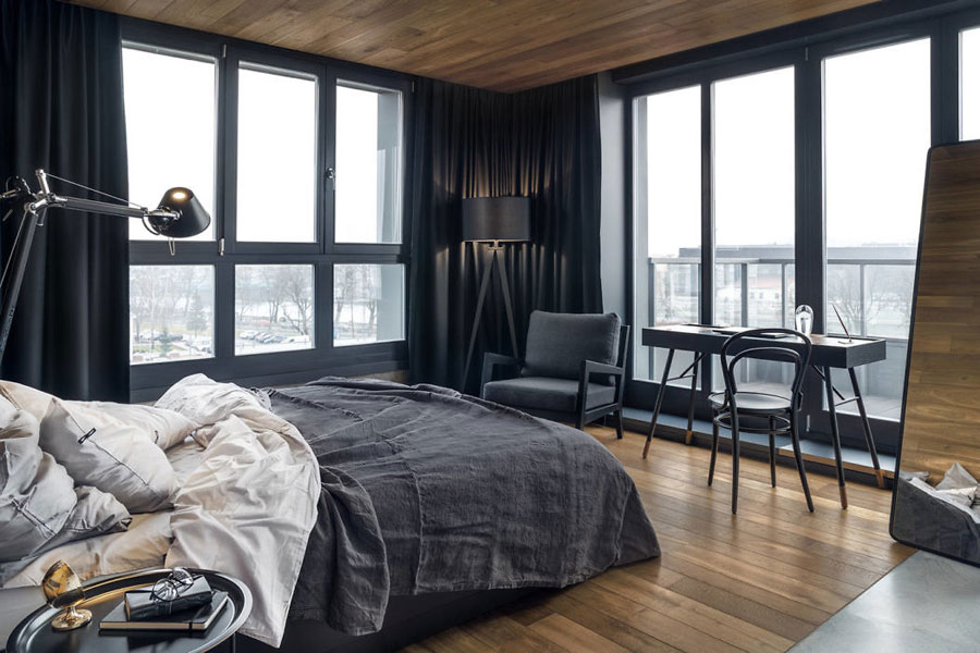 Stoere slaapkamer met beton en hout door Blackhaus