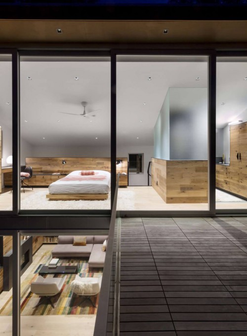 Veel hout in een open slaapkamer Veel hout in een open slaapkamer
