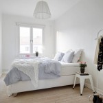 Witte inrichting in een Scandinavische slaapkamer
