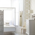 Witte slaapkamer met gouden details